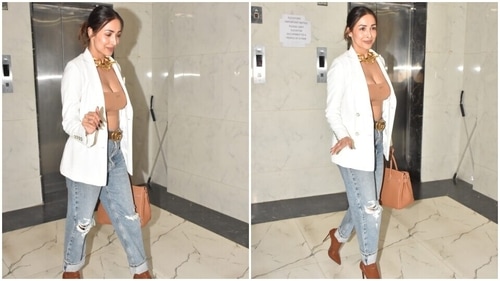 Malaika Arora chose chic accessories with the ensemble. (HT Photo/Varinder Chawla) Malaika Arora chose chic accessories with the ensemble. (HT Photo/Varinder Chawla)