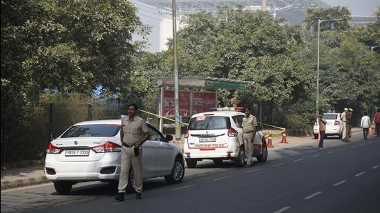Police have cordoned off the bus queue shelter on August Kranti Marg, where the murder took place, near Huda City Centre Metro Station, in Gurugram, India, on Friday. (Parveen Kumar/HT Photo) Police have cordoned off the bus queue shelter on August Kranti Marg, where the murder took place, near Huda City Centre Metro Station, in Gurugram, India, on Friday. (Parveen Kumar/HT Photo)