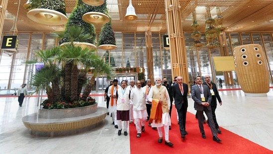 Prime Minister Narendra Modi with Union minister Pralhad Joshi, Karnataka Governor Thaawarchand Gehlot, and others at the newly-inaugurated Terminal 2 of Kempegowda International Airport in Bengaluru.(PTI)