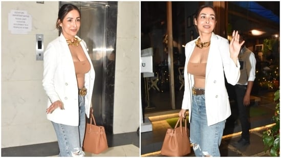 Malaika Arora makes a stylish appearance in a bralette, distressed jeans and blazer. (HT Photo/Varinder Chawla)