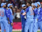 India's Hardik Pandya, centre, is congratulated by teammates after taking the wicket of Zimbabwe's Craig Ervine during the T20 World Cup cricket match between India and Zimbabwe in Melbourne, Australia, Sunday, Nov. 6, 2022. AP/PTI(AP11_06_2022_000148A) India's Hardik Pandya, centre, is congratulated by teammates after taking the wicket of Zimbabwe's Craig Ervine during the T20 World Cup cricket match between India and Zimbabwe in Melbourne, Australia, Sunday, Nov. 6, 2022. AP/PTI(AP11_06_2022_000148A)