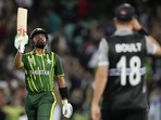 Babar Azam gestures with his bat on scoring 50 runs during the T20 World Cup cricket semifinal between New Zealand and Pakistan in Sydney.(AP) Babar Azam gestures with his bat on scoring 50 runs during the T20 World Cup cricket semifinal between New Zealand and Pakistan in Sydney.(AP)
