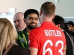 Pakistan's Captain Babar Azam (L) shakes hands with England's Captain Jos Buttler Pakistan's Captain Babar Azam (L) shakes hands with England's Captain Jos Buttler