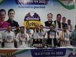 Congress party leader and Chief Minister of Rajasthan state Ashok Gehlot, centre, and other party leaders release the party's election manifesto for the upcoming Gujarat state assembly elections in Ahmedabad. Congress party leader and Chief Minister of Rajasthan state Ashok Gehlot, centre, and other party leaders release the party's election manifesto for the upcoming Gujarat state assembly elections in Ahmedabad.