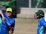 Matthew Hayden (L) during a training session