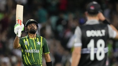 Babar Azam gestures with his bat on scoring 50 runs during the T20 World Cup cricket semifinal between New Zealand and Pakistan in Sydney. (AP) Babar Azam gestures with his bat on scoring 50 runs during the T20 World Cup cricket semifinal between New Zealand and Pakistan in Sydney. (AP)
