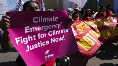 Demonstrators participate in a protest at the COP27 U.N. Climate Summit, Saturday. (AP)