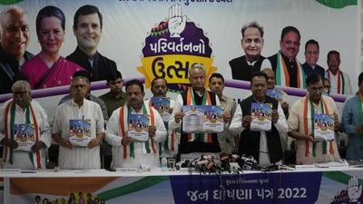 Congress party leader and Chief Minister of Rajasthan state Ashok Gehlot, centre, and other party leaders release the party's election manifesto for the upcoming Gujarat state assembly elections in Ahmedabad. (AP) Congress party leader and Chief Minister of Rajasthan state Ashok Gehlot, centre, and other party leaders release the party's election manifesto for the upcoming Gujarat state assembly elections in Ahmedabad. (AP)