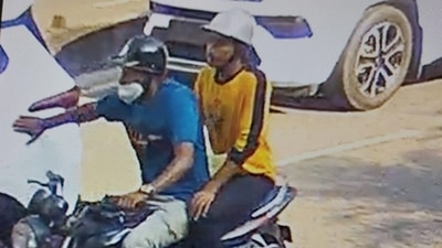 Bengaluru: Two people on a bike fake an accident to extort money. (Twitter) Bengaluru: Two people on a bike fake an accident to extort money. (Twitter)