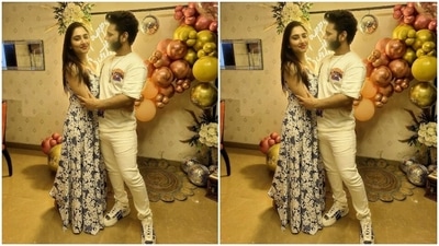 For the birthday celebrations, Disha chose a sleeveless printed maxi dress featuring a front thigh-high slit, one-shoulder neckline, black-and-white floral patterns and a figure-skimming silhouette. She styled the ensemble with a gold choker necklace, sleek bracelets, rings, open tresses, berry-toned lip shade, glowing skin, blushed cheeks, and darkened brows.  (Instagram)