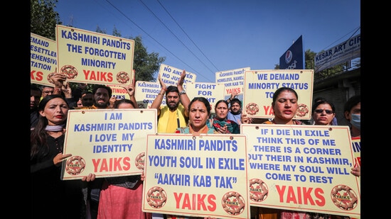 Members of the Youth All India Kashmiri Samaj, Jammu-based frontal organisation of the displaced Kashmiri Pandits, hold a protest, in Jammu on Saturday. (PTI)