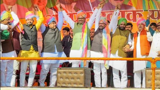 Former Union minister Mukhtar Abbas Naqvi, Uttar Pradesh deputy chief minister Brajesh Pathak and others at the Alpsankhyak Pasmanda Sammelan in Rampur on Saturday. (PTI PHOTO)