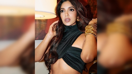 Bhumi Pednekar is a big time fashionista who knows how to cast a spell on her fans with her stunning appearances. For a recent award show, the actor opted for a black satin gown (Instagram/@bhumipednekar)