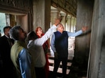 Vice President Jagdeep Dhankhar with his wife Sudesh Dhankhar and external affairs minister S. Jaishankar looks at stone carvings based on Indian mythological stories during visit to the Angkor Wat temple at Angkor Archaeological Park, in Siem Reap, Cambodia, November 13.