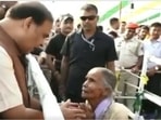 The chief minister directed officials to ensure the woman's land dispute is resolved and she can get a home of her own.