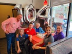 The image shows the eatery celebrating 104th birthday of a regular customer.