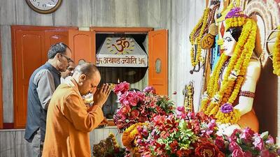 Uttar Pradesh chief minister Yogi Adityanath offers prayers at Gorakhnath temple in Gorakhpur on Sunday. (PTI PHOTO) Uttar Pradesh chief minister Yogi Adityanath offers prayers at Gorakhnath temple in Gorakhpur on Sunday. (PTI PHOTO)