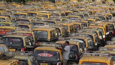 Mumbai, India - 2 Sept. 2015 : The black and yellow taxi observes strike against uber and ola cabs, The strike continues for the second day. All the taxi drivers line up at CST international airport, Andheri, in Mumbai, India, on Wednesday, September 2, 2015. (Photo by Pramod Thakur/ Hindustan Times) (Hindustan Times)