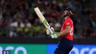 Jos Buttler kept the scoring rate in the first 10 overs for England but he eventually fell for 26 off 17 balls (AP) Jos Buttler kept the scoring rate in the first 10 overs for England but he eventually fell for 26 off 17 balls (AP)