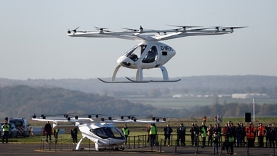 A Volocopter 2X drone taxi performs an integrated flight in conventional air traffic in Paris. (REUTERS)
