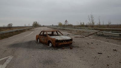 Russia-Ukraine War: Destroyed car is seen on a highway to Kherson city. (Reuters)