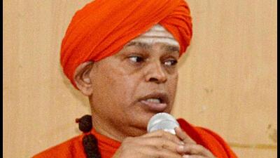 Police said the woman was arrested on charges of conspiring with the mutt’s high school teacher Basavarajendra and Mysuru-based NGO Odanadi to frame Lingayat seer Shivamurthy Murugha Sharanaru in the rape case. (PTI) Police said the woman was arrested on charges of conspiring with the mutt’s high school teacher Basavarajendra and Mysuru-based NGO Odanadi to frame Lingayat seer Shivamurthy Murugha Sharanaru in the rape case. (PTI)