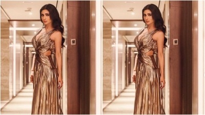 Mouni played muse to fashion designer Shivani Awasty and picked a metallic gown from the shelves of the designer. (Instagram/@imouniroy) Mouni played muse to fashion designer Shivani Awasty and picked a metallic gown from the shelves of the designer. (Instagram/@imouniroy)