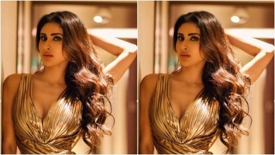 Mouni minimally accessorised her look for the day in white painted nails and a diamond ring in one hand. (Instagram/@imouniroy) Mouni minimally accessorised her look for the day in white painted nails and a diamond ring in one hand. (Instagram/@imouniroy)
