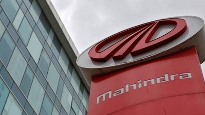 The logo of Mahindra and Mahindra is seen at a showroom in Mumbai in this file photo. The logo of Mahindra and Mahindra is seen at a showroom in Mumbai in this file photo.