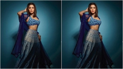 Nushrratt decked up in a blue sleeveless blouse with dark blue patterns and a plunging neckline. It also featured embellishments in blue threads at the borders. (Instagram/@nushrrattbharuccha) Nushrratt decked up in a blue sleeveless blouse with dark blue patterns and a plunging neckline. It also featured embellishments in blue threads at the borders. (Instagram/@nushrrattbharuccha)