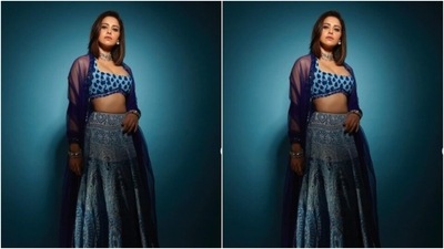Nushrratt played muse to fashion designer Manish Malhotra and picked a blue lehenga from the shelves of the designer. (Instagram/@nushrrattbharuccha) Nushrratt played muse to fashion designer Manish Malhotra and picked a blue lehenga from the shelves of the designer. (Instagram/@nushrrattbharuccha)