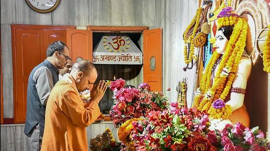 Uttar Pradesh chief minister Yogi Adityanath offers prayers at Gorakhnath temple in Gorakhpur on Sunday. (PTI PHOTO)