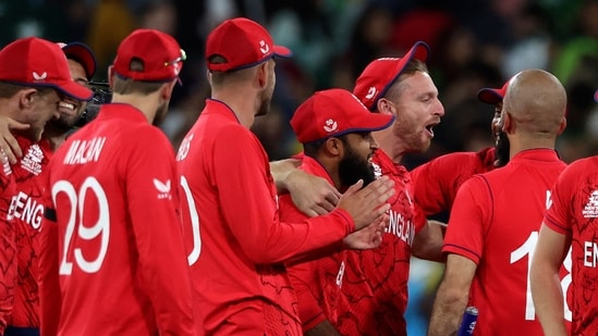 England's Jos Buttler, third right, celebrates with teammates after defeating Pakistan in the final of the T20 World Cup at the Melbourne Cricket Ground in Melbourne.(AP)