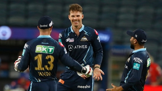 Lockie Ferguson celebrates with Gujarat Titans teammates after picking a wicket(PTI/File Photo)