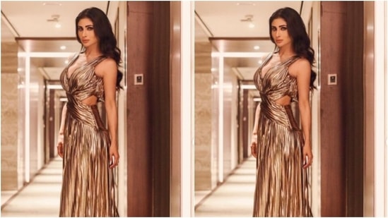 Mouni played muse to fashion designer Shivani Awasty and picked a metallic gown from the shelves of the designer. (Instagram/@imouniroy)