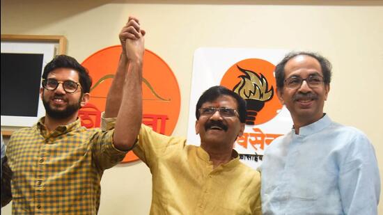 Shiv Sena (Uddhav Balasaheb Thackeray) leader and MP Sanjay Raut with party chief Uddhav Thackeray and Aaditya Thackeray on Thursday (HT PHOTO)