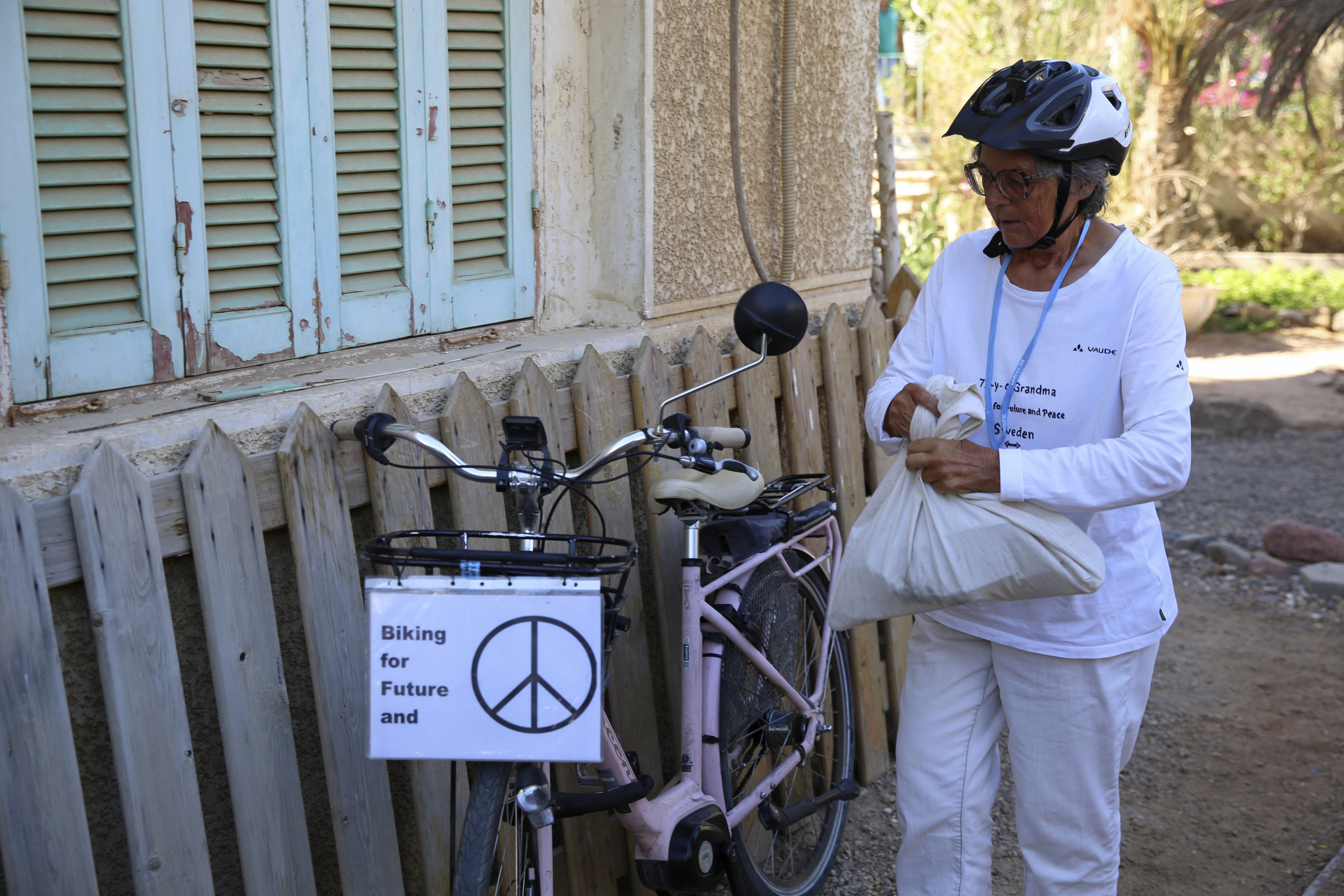 Since her arrival a week ago, Hildebrandt and her e-bike have become a fixture at the summit. (AP)