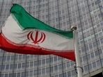 Iran: An Iranian flag flutters.