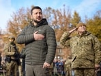 Ukrainian President Volodymyr Zelenskyy listens to the national anthem during his visit to Kherson, Ukraine, on November 14.
