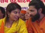 BJP candidate Rivaba Jadeja and her husband, cricketer Ravindra Jadeja, at a party event in Gujarat's Jamnagar (Credit: ANI)