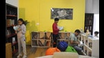 Children and adults immersed in their reading at a public library in Gurgaon. (Parveen Kumar/HT) Children and adults immersed in their reading at a public library in Gurgaon. (Parveen Kumar/HT)
