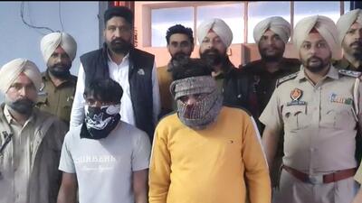 The gangsters in Tarn Taran police custody on Monday. (HT Photo)