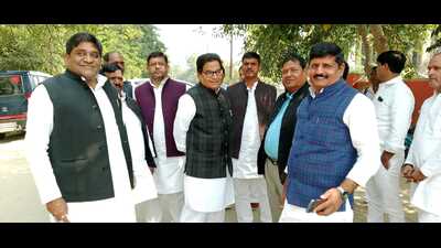 Samajwadi Party national general secretary Ram Gopal Yadav (bespectacled) in Mainpuri on Monday. (HT photo) Samajwadi Party national general secretary Ram Gopal Yadav (bespectacled) in Mainpuri on Monday. (HT photo)