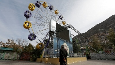Afghanistan: An Afghan man stands in an amusement park in Kabul, Afghanistan. (Reuters)