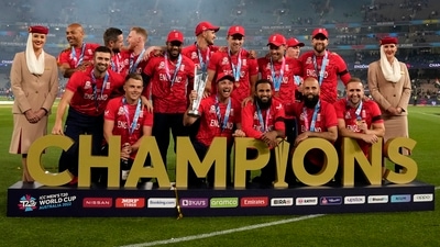 England players celebrate with the winners trophy after their win against Pakistan in the final of the T20 World Cup at the Melbourne Cricket Ground in Melbourne. (AP)