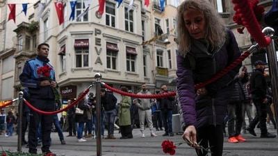 Istanbul: People put flowers over a memorial placed on the spot of Sunday's explosion. (AP)