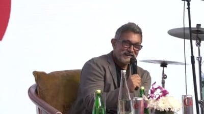 Aamir Khan speaking at an event in Delhi recently in his new all-grey look.