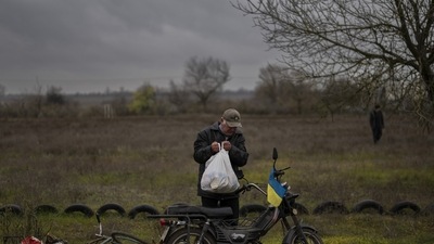 Russia-Ukraine War: A resident collects a food donation in Novokyivka, southern Ukraine. (AP)