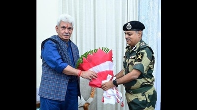 BSF’s western command P V Rama Sastry with J&K LG Manoj Sinha on Monday. (HT Photo)