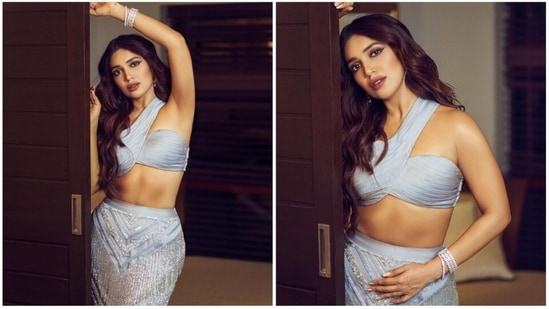 The gorgeous Bhumi Pednekar is leaving no stone unturned in impressing the fashion gods with her sartorial wardrobe choices. The actor has lately been giving major supermodel vibes with her top-notch silhouettes. For a recent occasion, the actor picked a smokey blue skirt set Garima Karwariya Designs.(Instagram/@bhumipednekar)